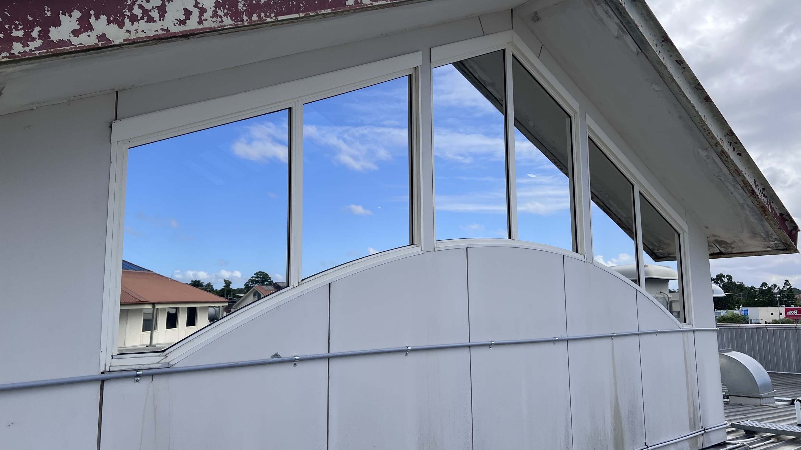 Grand Plaza Shopping Centre rooftop glazing after commercial window film installation.