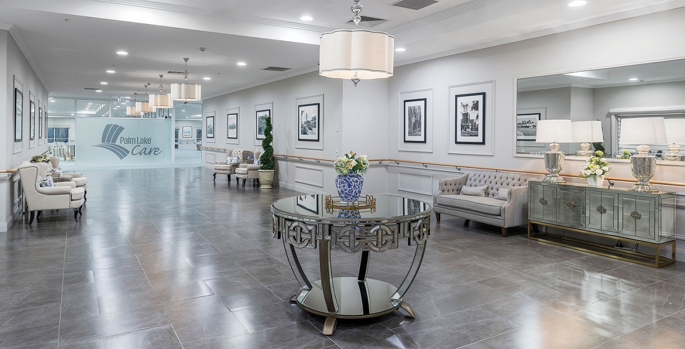 Palm Lake Care Bargara lobby with interior glazing and natural light.