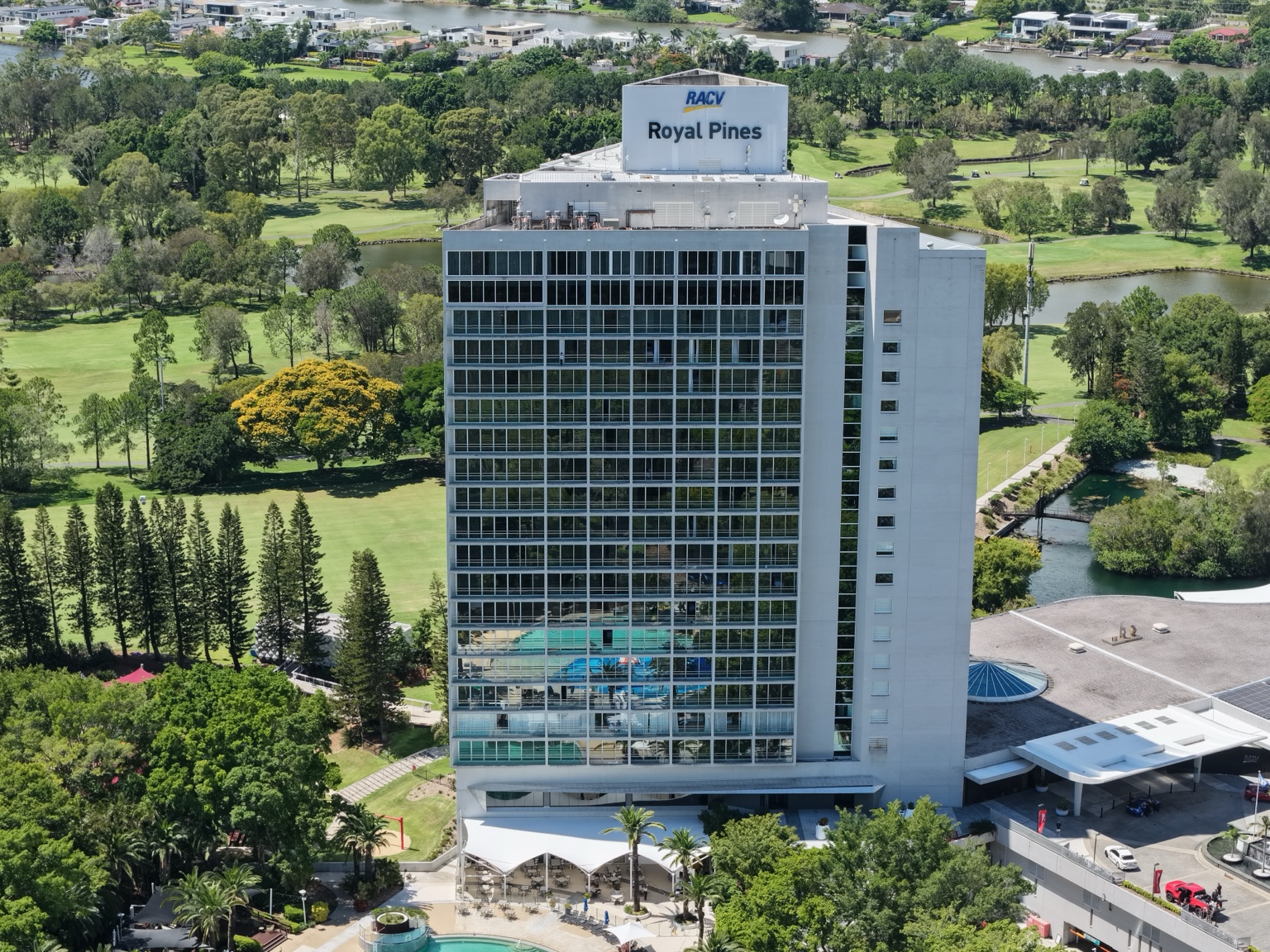 Aerial view of the front facade of RACV Royal Pines Resort showing the completed tower window film.