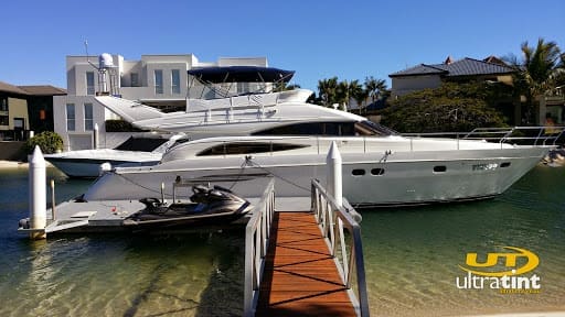 Marine vessel glazing with professional tinting applied.