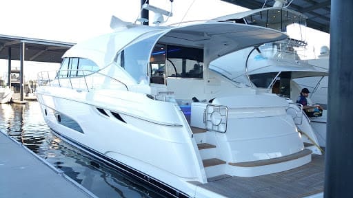 Boat cabin glazing with installed marine window film.
