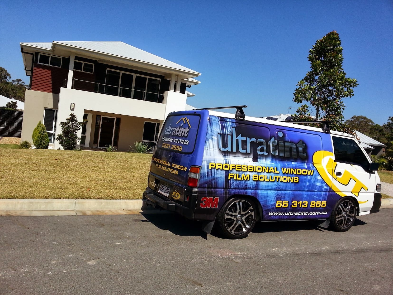 Residential window tinting project with broad home glazing.